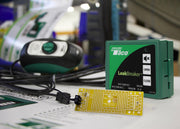 Teco LeakBreaker device on a table with a blurred background